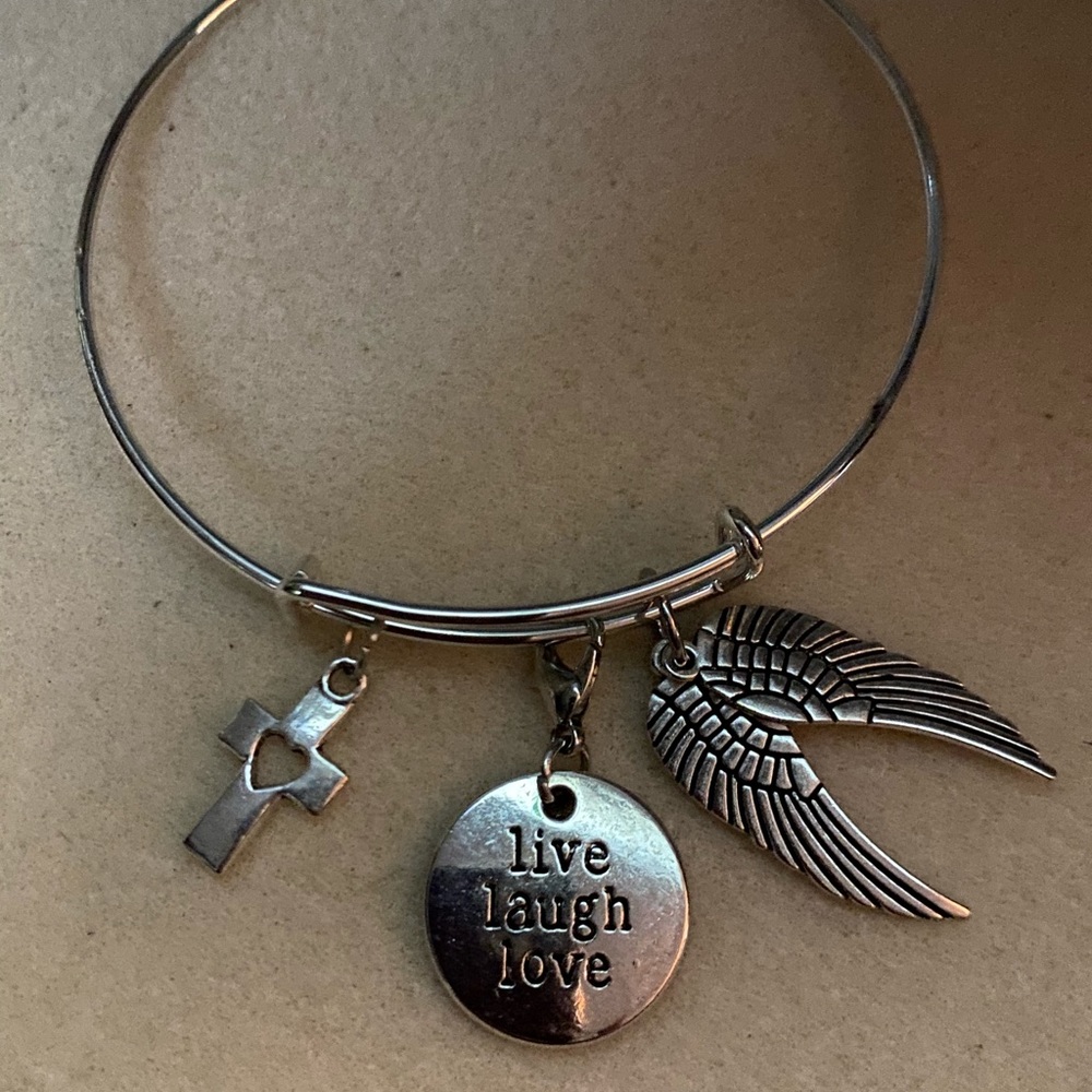 Silver bangle bracelet.
Remember the loved ones